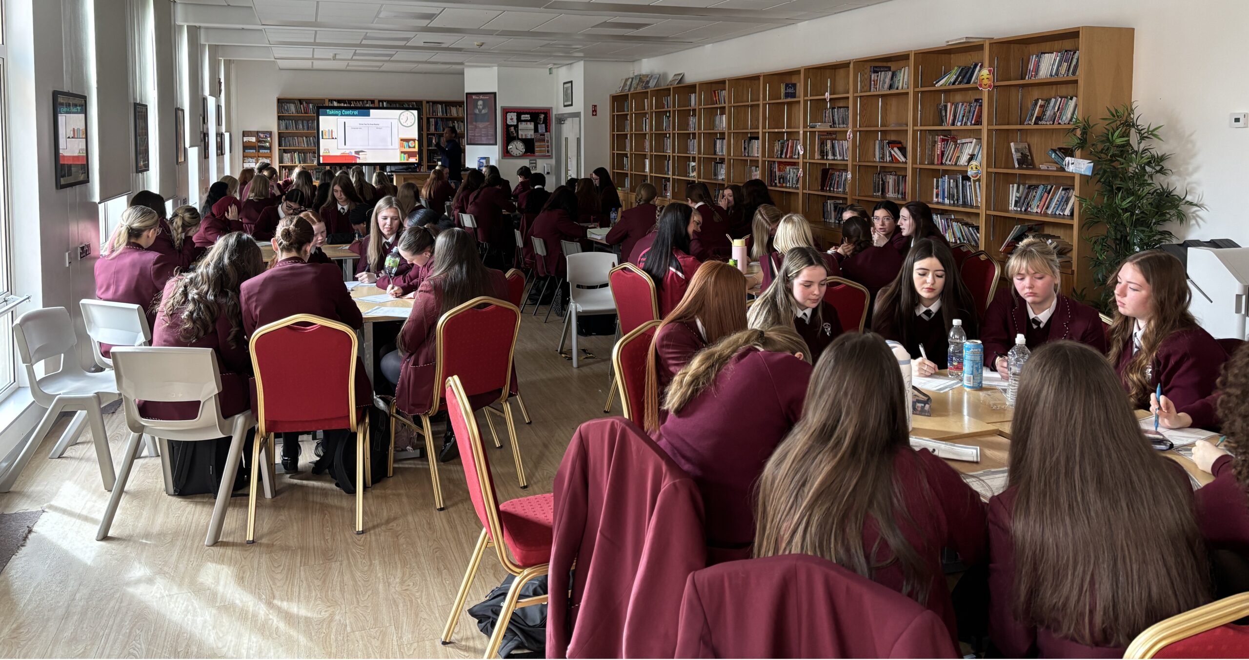 Pupils working together at tables